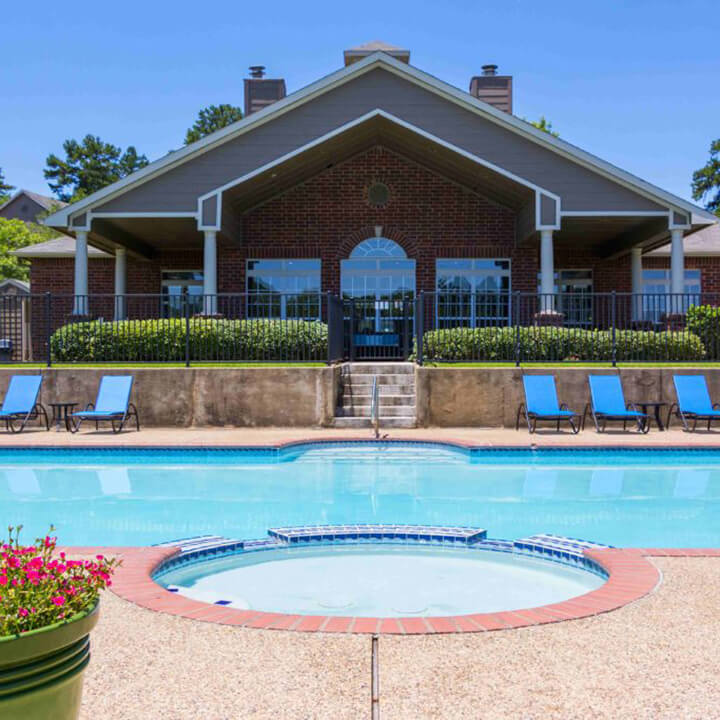 SBTX_pool_gallery_jan23 Beautiful pool and clubhouse area with sundeck and hottub area at summer brook apartments in longview